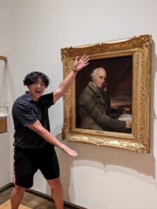 Anthony showing off an painting of Benjamin Rush