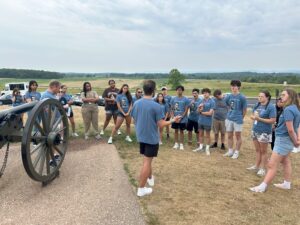 Cooper giving lecture at Peace Monument