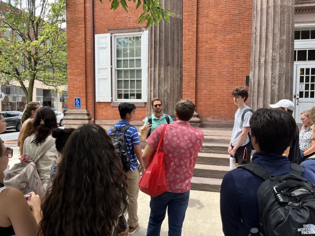 Students standing and listening