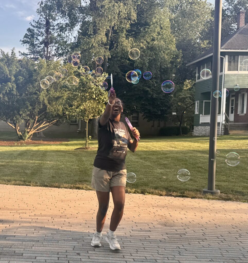 Girl blowing bubbles