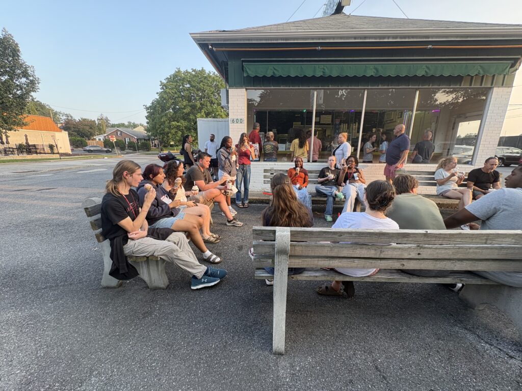 Kids sitting outside Massey's frozen custard, enjoying some ice cream and chit chatting