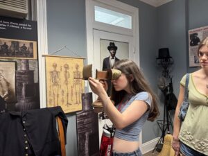 Exploring the historical artifacts on the House Divided Tour