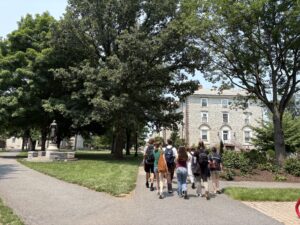 The students walking to the HUB