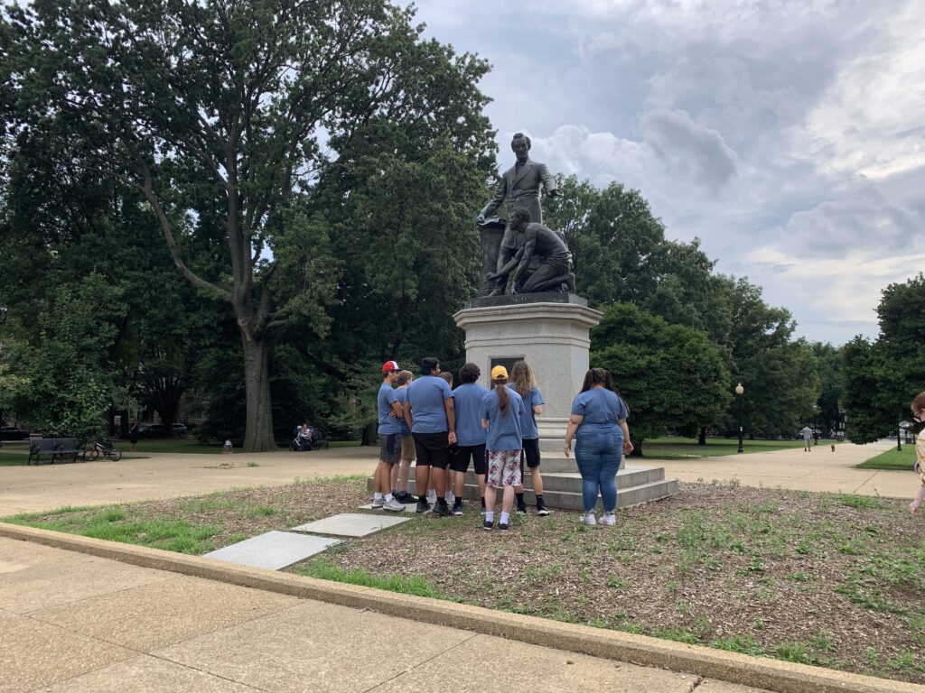 students at Emancipation Memorial